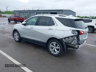 2021 Chevrolet Equinox Premier with VIN 3GNAXNEV4MS153066, listed as a IAAI auction lot 42413071 with 43,052 mi miles and . Bid and sale history available at DreamBid. Image 3.