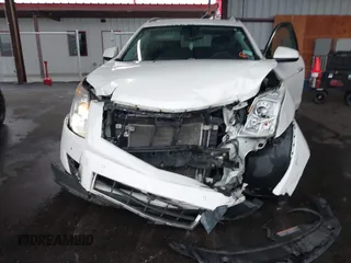 2012 Cadillac SRX Luxury Collection with VIN 3GYFNAE37CS644073, listed as a IAAI auction lot 41965214 with 179,400 mi miles and . Bid and sale history available at carsss.com. Image 6.