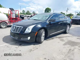 2014 Cadillac XTS Luxury z VIN 2G61N5S30E9170305, wystawiony jako IAAI lot #42223317 z przebiegiem 103 692 mil mil oraz . Historia ofert i sprzedaży dostępna na DreamBid. Obrazek 17.