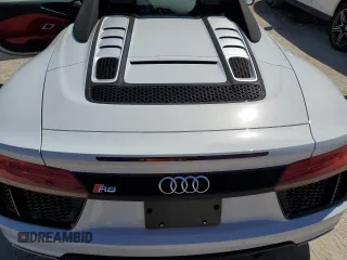 2018 Audi R8 z VIN WUAVACFX1J7900121, wystawiony jako Copart lot #75092964 z przebiegiem Nie podano mil oraz Szkody całkowita. Historia ofert i sprzedaży dostępna na DreamBid. Obrazek 11.