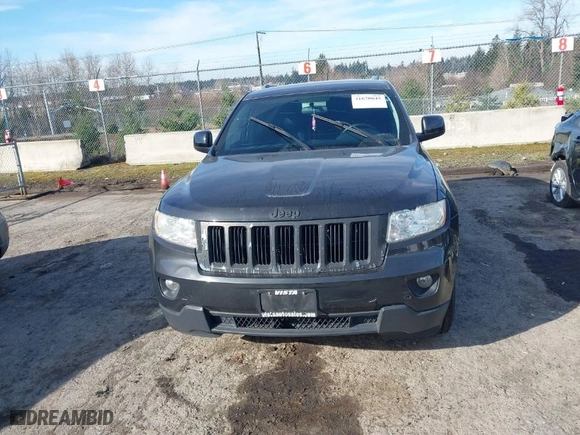 2011 Jeep Grand Cherokee Laredo with VIN 1J4RR4GG2BC670264, listed as a IAAI auction lot 41670045 with 252,044 mi miles. Bid and sale history available at carsss.com. Image 12.