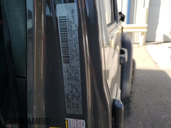 2020 Jeep Gladiator Rubicon with VIN 1C6JJTBG9LL163270, listed as a Copart auction lot 53654005 with 74,744 mi miles and Salvage title. Bid and sale history available at DreamBid. Image 12.