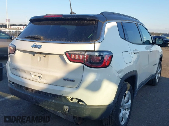 2019 Jeep Compass Latitude with VIN 3C4NJDBB4KT714079, listed as a IAAI auction lot 41317866 with 76,601 mi miles and . Bid and sale history available at DreamBid. Image 4.