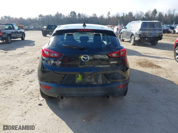 2016 Mazda CX-3 Sport with VIN JM1DKBB75G0124907, listed as a IAAI auction lot 42107232 with 128,411 mi miles. Bid and sale history available at carsss.com. Image 16.
