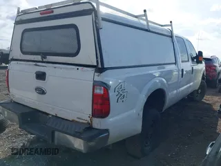 2015 Ford F-250 Lariat with VIN 1FT7W2B62FED04453, listed as a IAAI auction lot 41879422 with 313,725 mi miles and . Bid and sale history available at DreamBid. Image 4.