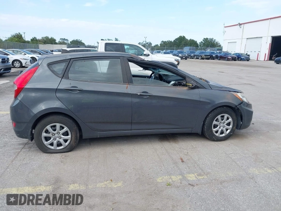 2012 Hyundai Accent GS with VIN KMHCT5AE7CU050253, listed as a IAAI auction lot 40601479 with 88,734 mi miles. Bid and sale history available at carsss.com. Image 13.