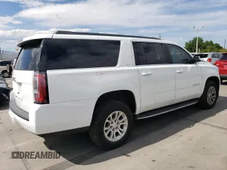 2019 GMC Yukon XL SLT with VIN 1GKS2GKC5KR362816, listed as a Copart auction lot 69062794 with 96,321 mi miles and Salvage Title. Bid and sale history available at DreamBid. Image 3.