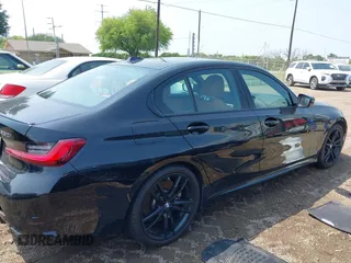 2023 BMW 3 Series 330i with VIN 3MW69FF09P8D39007, listed as a IAAI auction lot 42071643 with 24,781 mi miles and . Bid and sale history available at DreamBid. Image 13.