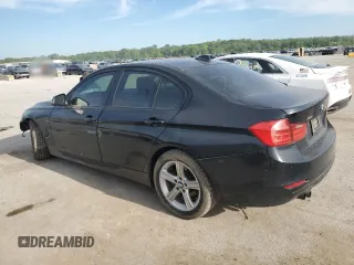 2014 BMW 3 Series 328i xDrive with VIN WBA3B5G58ENS11072, listed as a Copart auction lot 56572315 with 145,000 mi miles and Salvage title. Bid and sale history available at DreamBid. Image 2.