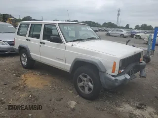 1999 Jeep Cherokee SE with VIN 1J4FF28S3XL672857, listed as a Copart auction lot 62032845 with 192,486 mi miles and Clean title. Bid and sale history available at DreamBid. Image 4.