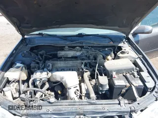2001 Toyota Camry CE z VIN 4T1BG22K51U817811, wystawiony jako IAAI lot #42378357 z przebiegiem 347 362 mil mil oraz . Historia ofert i sprzedaży dostępna na DreamBid. Obrazek 10.