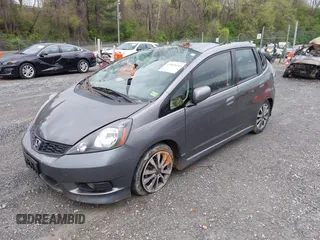 2013 Honda Fit Sport with VIN JHMGE8H56DC029276, listed as a IAAI auction lot 42002632 with 199,549 mi miles. Bid and sale history available at carsss.com. Image 2.