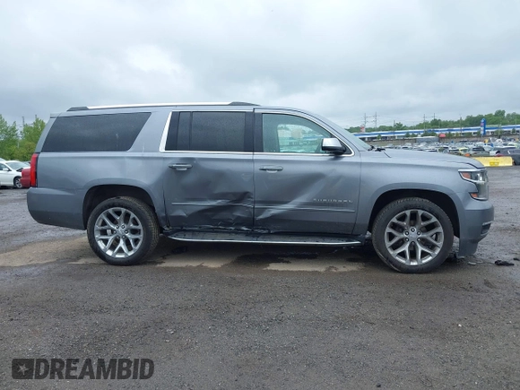 2019 Chevrolet Suburban Premier with VIN 1GNSKJKC9KR288722, listed as a IAAI auction lot 42282877 with 161,795 mi miles and . Bid and sale history available at DreamBid. Image 13.