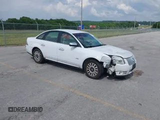 2008 Mercury Sable with VIN 1MEHM40W68G609467, listed as a IAAI auction lot 39694813 with 64,597 mi miles. Bid and sale history available at carsss.com. Image 1.