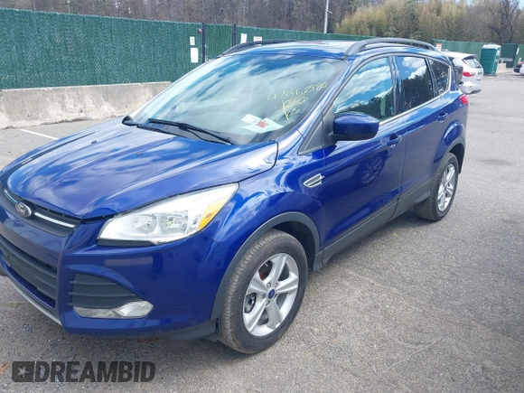 2014 Ford Escape SE with VIN 1FMCU9G93EUC54050, listed as a IAAI auction lot 42062980 with 129,015 mi miles. Bid and sale history available at carsss.com. Image 2.