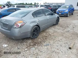 2008 Nissan Altima SE z VIN 1N4BL21E58C210986, wystawiony jako IAAI lot #42322119 z przebiegiem 154 546 mil mil oraz . Historia ofert i sprzedaży dostępna na DreamBid. Obrazek 4.