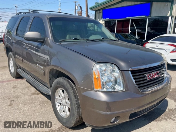 2012 GMC Yukon SLT with VIN 1GKS1CE05CR141571, listed as a Copart auction lot 49110005 with 116,634 mi miles and Clean Title. Bid and sale history available at carsss.com. Image 1.