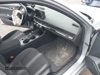 2022 Honda Civic Sport z VIN 2HGFE2F56NH537728, wystawiony jako IAAI lot #41772928 z przebiegiem 38 147 mil mil oraz . Historia ofert i sprzedaży dostępna na DreamBid. Obrazek 5.