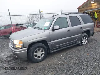 2005 GMC Yukon Denali z VIN 1GKEK63U25J228296, wystawiony jako IAAI lot #40980307 z przebiegiem 192 353 mil mil oraz . Historia ofert i sprzedaży dostępna na DreamBid. Obrazek 17.