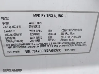 2023 Tesla Model Y Long Range with VIN 7SAYGDEE7PA023295, listed as a IAAI auction lot 41773783 with 28,079 mi miles. Bid and sale history available at carsss.com. Image 9.