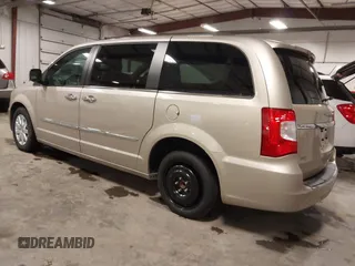 2014 Chrysler Town & Country Touring with VIN 2C4RC1BG2ER422914, listed as a IAAI auction lot 42017742 with 49,856 mi miles and . Bid and sale history available at DreamBid. Image 3.