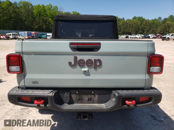 2023 Jeep Gladiator Rubicon с VIN 1C6JJTBG2PL542178, выставлен на аукционе Copart как лот 54684915 с пробегом 24 687 миль миль и Списание • Salvage title. История ставок и продаж доступна на DreamBid. Изображение 6.