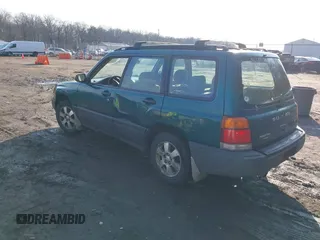 1999 Subaru Forester L with VIN JF1SF635XXH735202, listed as a IAAI auction lot 41489355 with 290,000 mi miles. Bid and sale history available at carsss.com. Image 3.