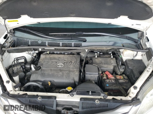 2012 Toyota Sienna XLE AAS with VIN 5TDYK3DC7CS275496, listed as a Copart auction lot 62612815 with 130,027 mi miles and Salvage title. Bid and sale history available at DreamBid. Image 12.