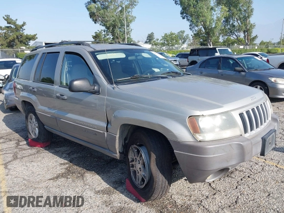 2004 Jeep Grand Cherokee Laredo with VIN 1J4GX48N24C334983, listed as a IAAI auction lot 42522088 with 169,793 mi miles and . Bid and sale history available at DreamBid. Image 1.