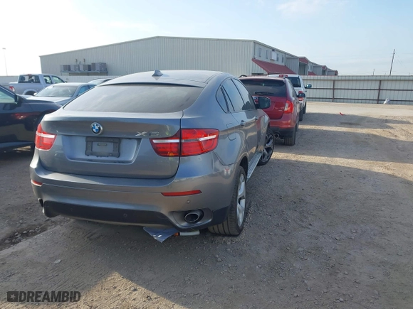 2014 BMW X6 xDrive35i with VIN 5UXFG2C58E0H11141, listed as a IAAI auction lot 42050279 with 191,119 mi miles. Bid and sale history available at carsss.com. Image 4.