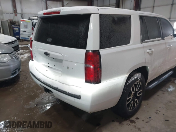 2015 Chevrolet Tahoe Commercial with VIN 1GNSK2EC8FR722684, listed as a IAAI auction lot 41553558 with 119,434 mi miles and . Bid and sale history available at DreamBid. Image 4.