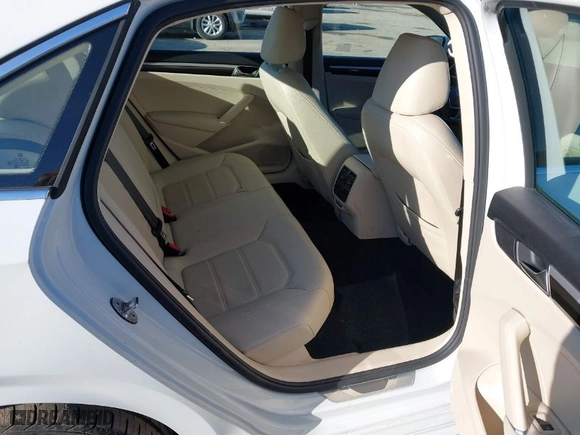 2019 Volkswagen Passat 2.0T SE R-Line with VIN 1VWMA7A32KC012553, listed as a IAAI auction lot 41509398 with 88,001 mi miles. Bid and sale history available at carsss.com. Image 8.