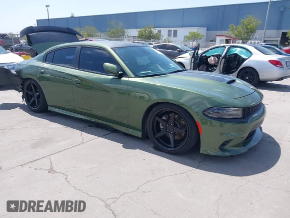 2021 Dodge Charger R/T with VIN 2C3CDXCT0MH652199, listed as a IAAI auction lot 42051678 with 11,798 mi miles and . Bid and sale history available at carsss.com. Image 1.
