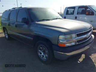 2001 Chevrolet Suburban LS z VIN 3GNEC16TX1G116606, wystawiony jako IAAI lot #42490114 z przebiegiem 305 223 mil mil oraz . Historia ofert i sprzedaży dostępna na DreamBid. Obrazek 1.