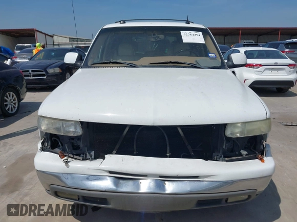 2004 Chevrolet Tahoe LT with VIN 1GNEC13Z94R117839, listed as a IAAI auction lot 42264254 with 230,597 mi miles and . Bid and sale history available at DreamBid. Image 13.