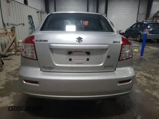2011 Suzuki SX4 LE with VIN JS2YC5A21B6300076, listed as a Copart auction lot 83118734 with 213,177 mi miles and Salvage Title. Bid and sale history available at carsss.com. Image 6.