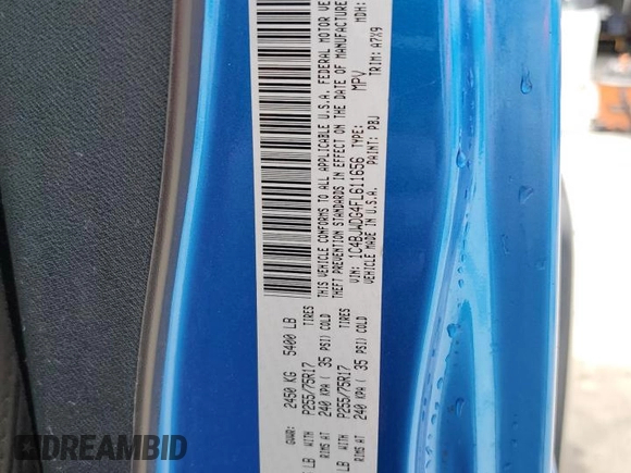 2015 Jeep Wrangler Unlimited Willys Wheeler with VIN 1C4BJWDG4FL611656, listed as a Copart auction lot 54010395 with 129,797 mi miles and Salvage Title. Bid and sale history available at DreamBid. Image 13.