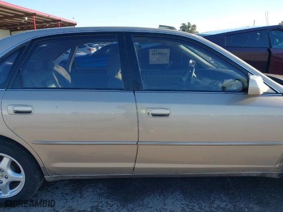 2000 Toyota Avalon XL with VIN 4T1BF28B5YU007096, listed as a IAAI auction lot 41409145 with NaN miles. Bid and sale history available at carsss.com. Image 14.