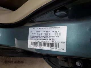 2000 Mazda Millenia z VIN JM1TA2212Y1610919, wystawiony jako Copart lot #80375014 z przebiegiem 127 938 mil mil oraz Szkody całkowita. Historia ofert i sprzedaży dostępna na DreamBid. Obrazek 15.