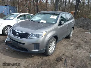 2014 Kia Sorento LX with VIN 5XYKT3A60EG533956, listed as a IAAI auction lot 41582215 with 130,026 mi miles. Bid and sale history available at carsss.com. Image 2.