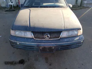 1992 Mercury Cougar z VIN 1MEPM6046NH628614, wystawiony jako Copart lot #77434664 z przebiegiem 83 518 mil mil oraz Szkody całkowita. Historia ofert i sprzedaży dostępna na DreamBid. Obrazek 11.