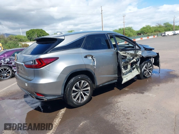 2020 Lexus RX with VIN 2T2HZMAA9LC163081, listed as a IAAI auction lot 41627232 with 38,153 mi miles. Bid and sale history available at carsss.com. Image 4.