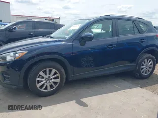 2016 Mazda CX-5 Sport z VIN JM3KE2BY0G0633611, wystawiony jako IAAI lot #42390654 z przebiegiem Nie podano mil oraz . Historia ofert i sprzedaży dostępna na DreamBid. Obrazek 15.