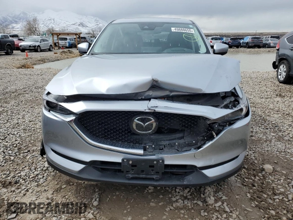 2021 Mazda CX-5 Grand Touring with VIN JM3KFBDM1M1403699, listed as a Copart auction lot 49888655 with 29,919 mi miles and Salvage Title. Bid and sale history available at carsss.com. Image 5.