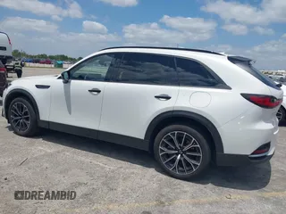 2025 Mazda CX-70 Premium Plus z VIN JM3KJEHA6S1103427, wystawiony jako IAAI lot #42108563 z przebiegiem 3741 mil mil oraz . Historia ofert i sprzedaży dostępna na DreamBid. Obrazek 14.