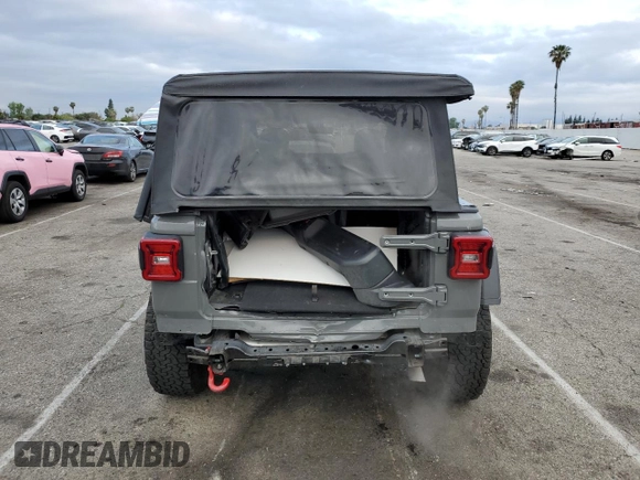 2022 Jeep Wrangler Unlimited Rubicon with VIN 1C4HJXFGXNW158038, listed as a Copart auction lot 53020575 with 14,355 mi miles and Salvage title. Bid and sale history available at DreamBid. Image 6.