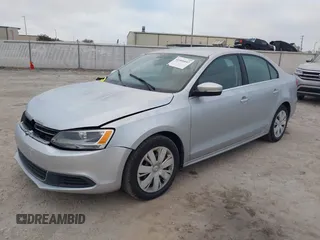 2013 Volkswagen Jetta SE with VIN 3VWDX7AJ0DM384908, listed as a IAAI auction lot 41466642 with 92,131 mi miles and . Bid and sale history available at DreamBid. Image 2.