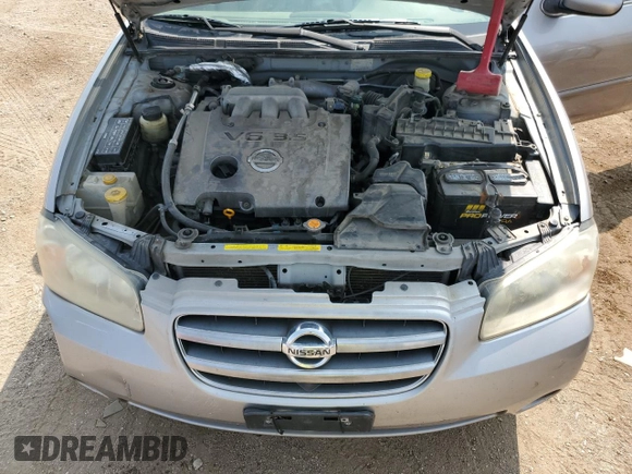2002 Nissan Maxima GLE z VIN JN1DA31A62T000726, wystawiony jako Copart lot #71235864 z przebiegiem 219 647 mil mil oraz Szkoda całkowita • Salvage title. Historia ofert i sprzedaży dostępna na DreamBid. Obrazek 11.