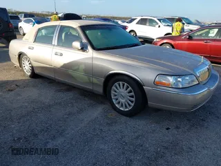 2003 Lincoln Town Car Executive z VIN 1LNHM81W73Y676570, wystawiony jako IAAI lot #40716237 z przebiegiem Nie podano mil oraz . Historia ofert i sprzedaży dostępna na DreamBid. Obrazek 1.