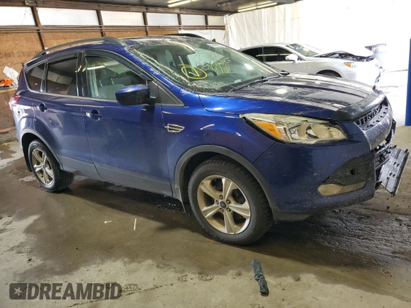 2014 Ford Escape SE with VIN 1FMCU9G90EUD21655, listed as a Copart auction lot 55458095 with 167,900 mi miles and Salvage Title. Bid and sale history available at DreamBid. Image 4.